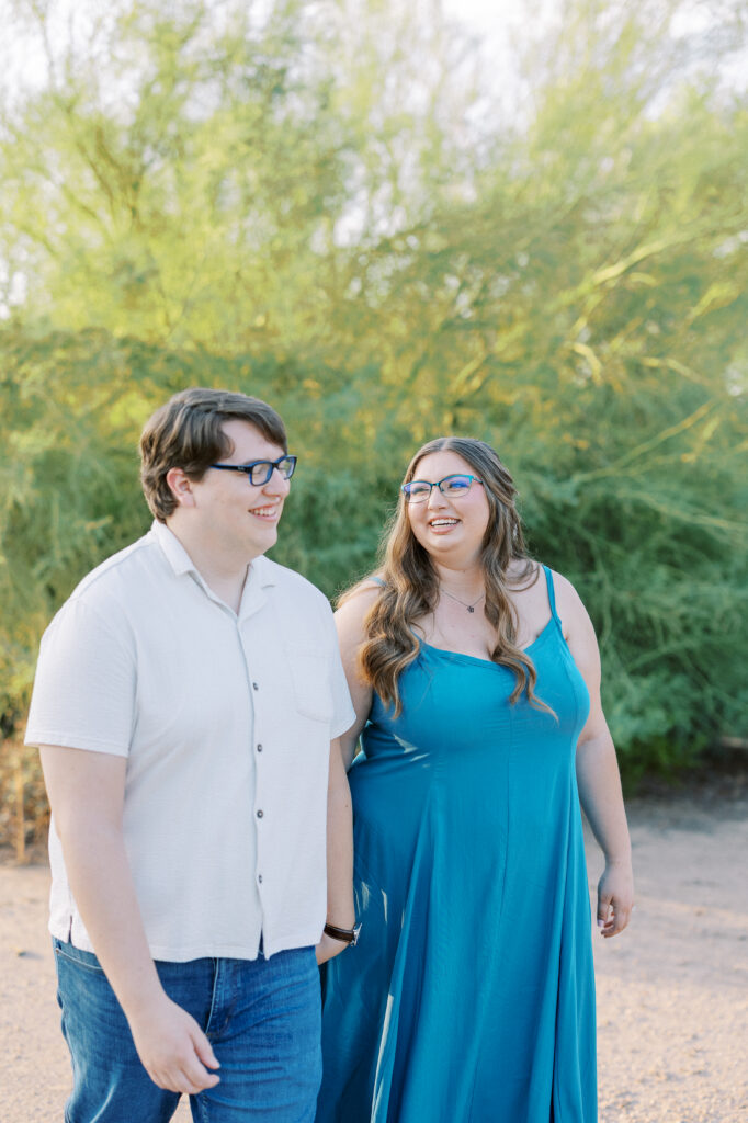 couple laughing at each other photoshoot