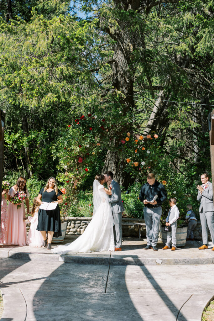 bride and groom ceremony kiss