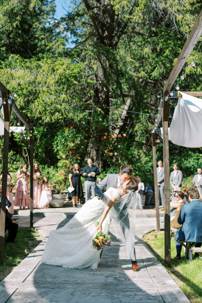 bride and groom aisle dip