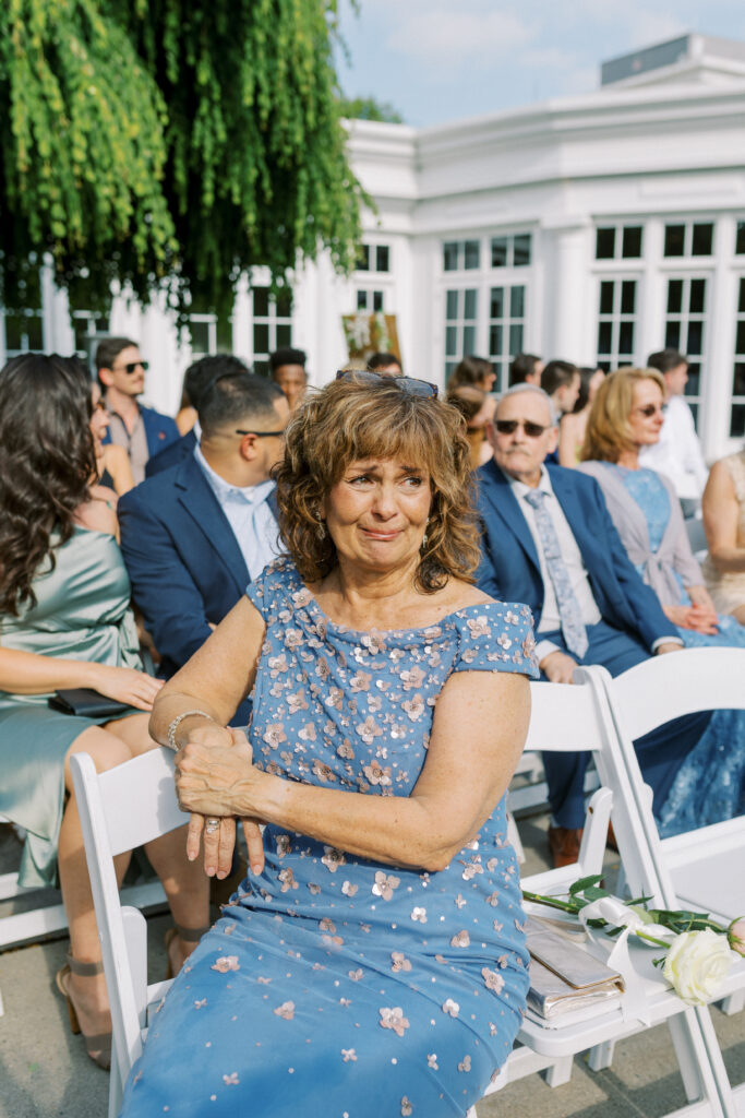 Mom of bride crying