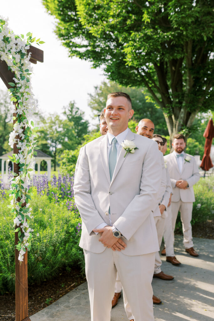 groom crying during ceremony